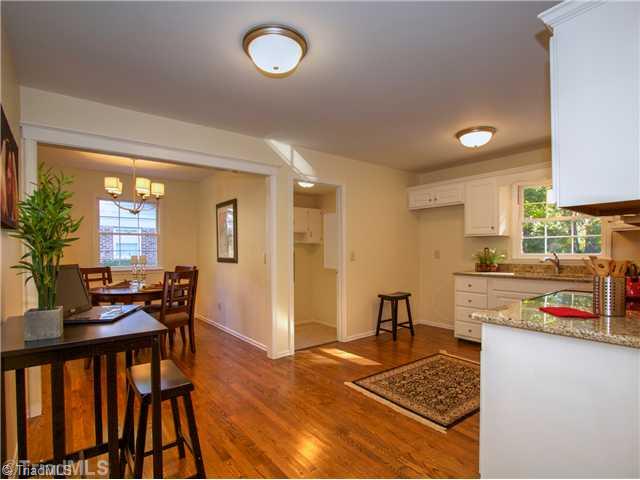 5110 Cheviot Road Greensboro, NC 27455 - Photo 5 of 16 Breakfast. The kitchen is open to the breakfast area and dining room.