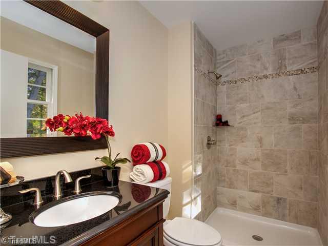 5110 Cheviot Road Greensboro, NC 27455 - Photo 10 of 16 Master Bath/Spa. Brand new custom bath awaits you: Custom vanity and granite top with nickel finish, custom tile floor and shower.
