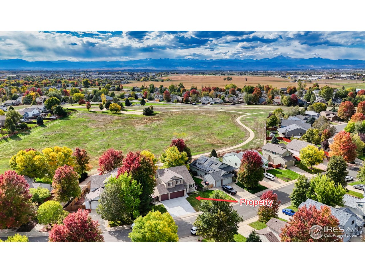 5415 Wolf Street Frederick, CO 80504 - Photo 1 of 29 a view of a city with a lake