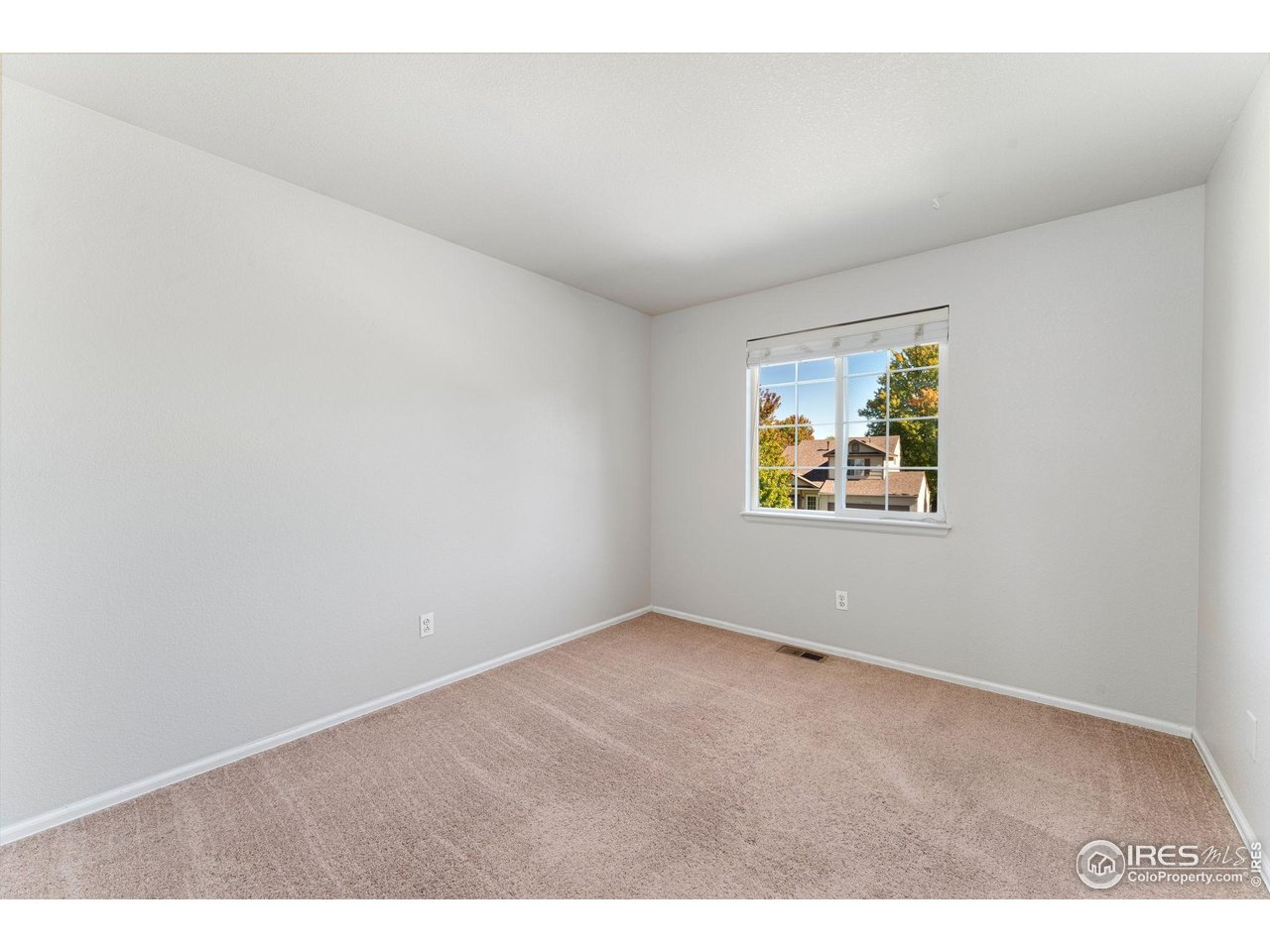 5415 Wolf Street Frederick, CO 80504 - Photo 25 of 29 an empty room with windows