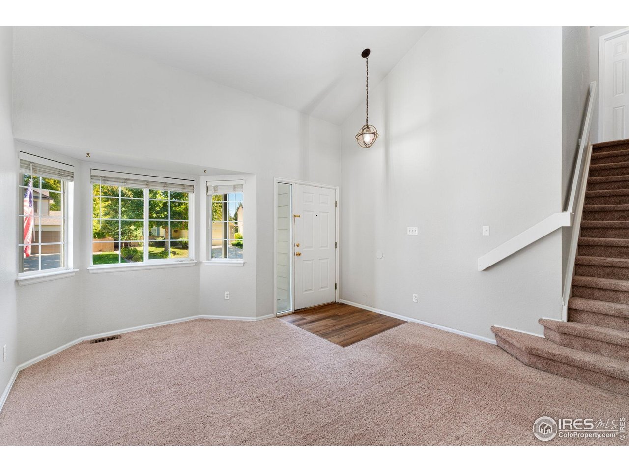 5415 Wolf Street Frederick, CO 80504 - Photo 5 of 29 a view of an empty room with a window