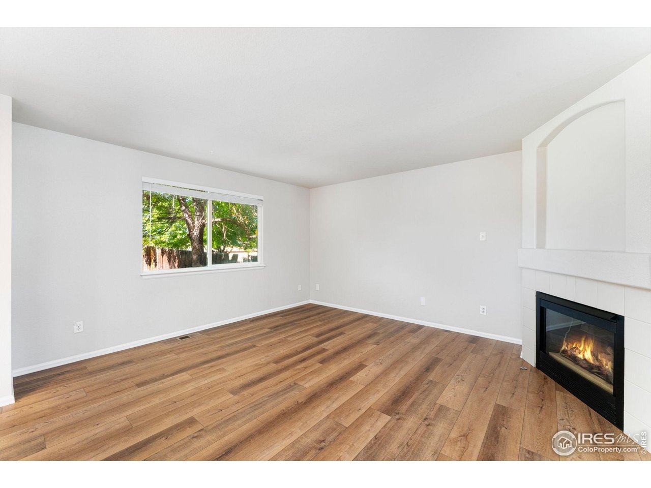 5415 Wolf Street Frederick, CO 80504 - Photo 9 of 29 a view of an empty room and window
