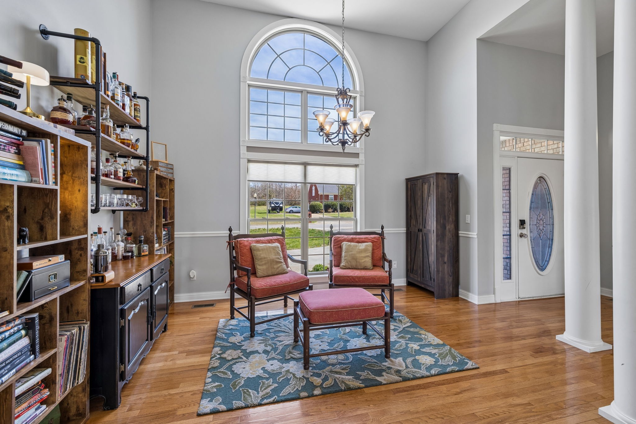 1062 Kacie Drive Pleasant View, TN 37146 - Photo 13 of 67 a living room with furniture a bookshelf and a window