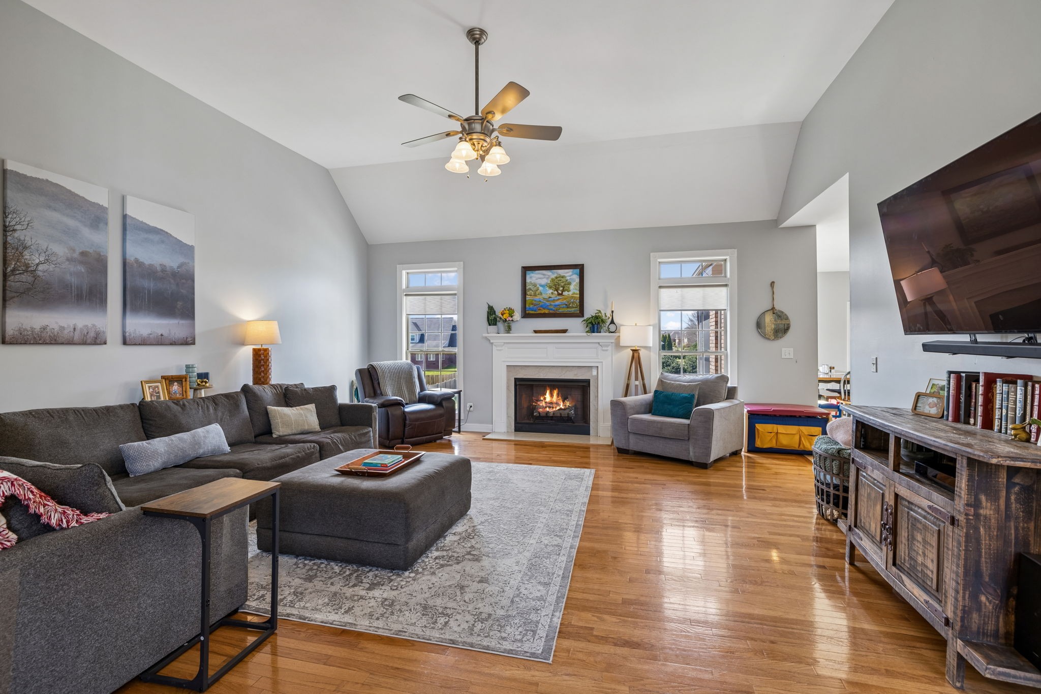1062 Kacie Drive Pleasant View, TN 37146 - Photo 16 of 67 a living room with furniture and a flat screen tv