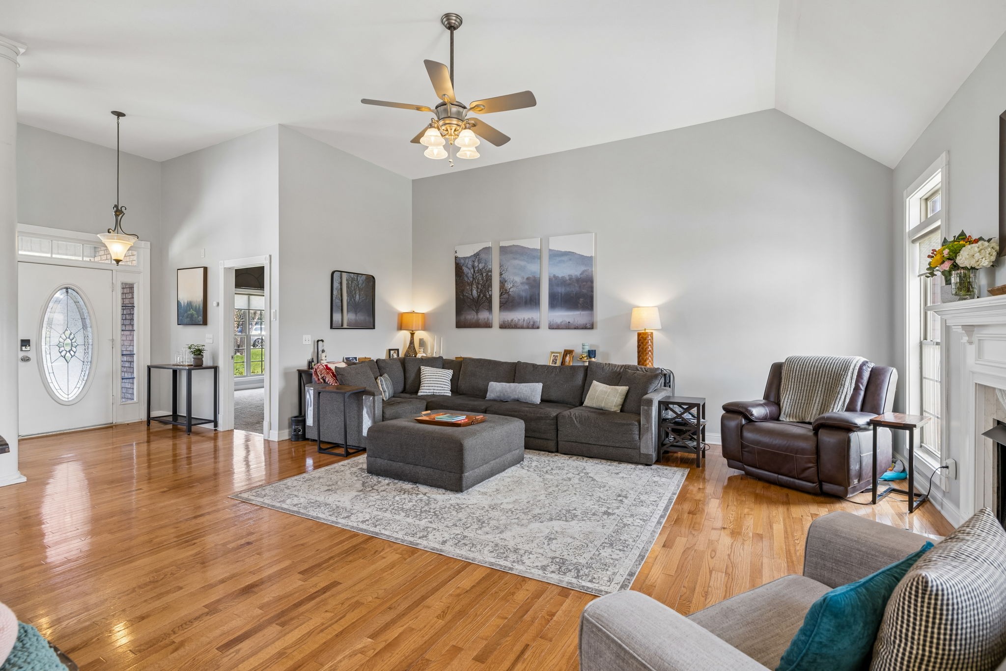 1062 Kacie Drive Pleasant View, TN 37146 - Photo 19 of 67 a living room with furniture kitchen view and a wooden floor