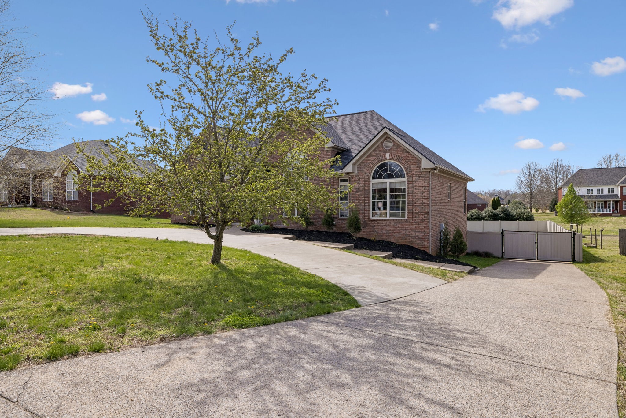 1062 Kacie Drive Pleasant View, TN 37146 - Photo 2 of 67 a house view with a garden space