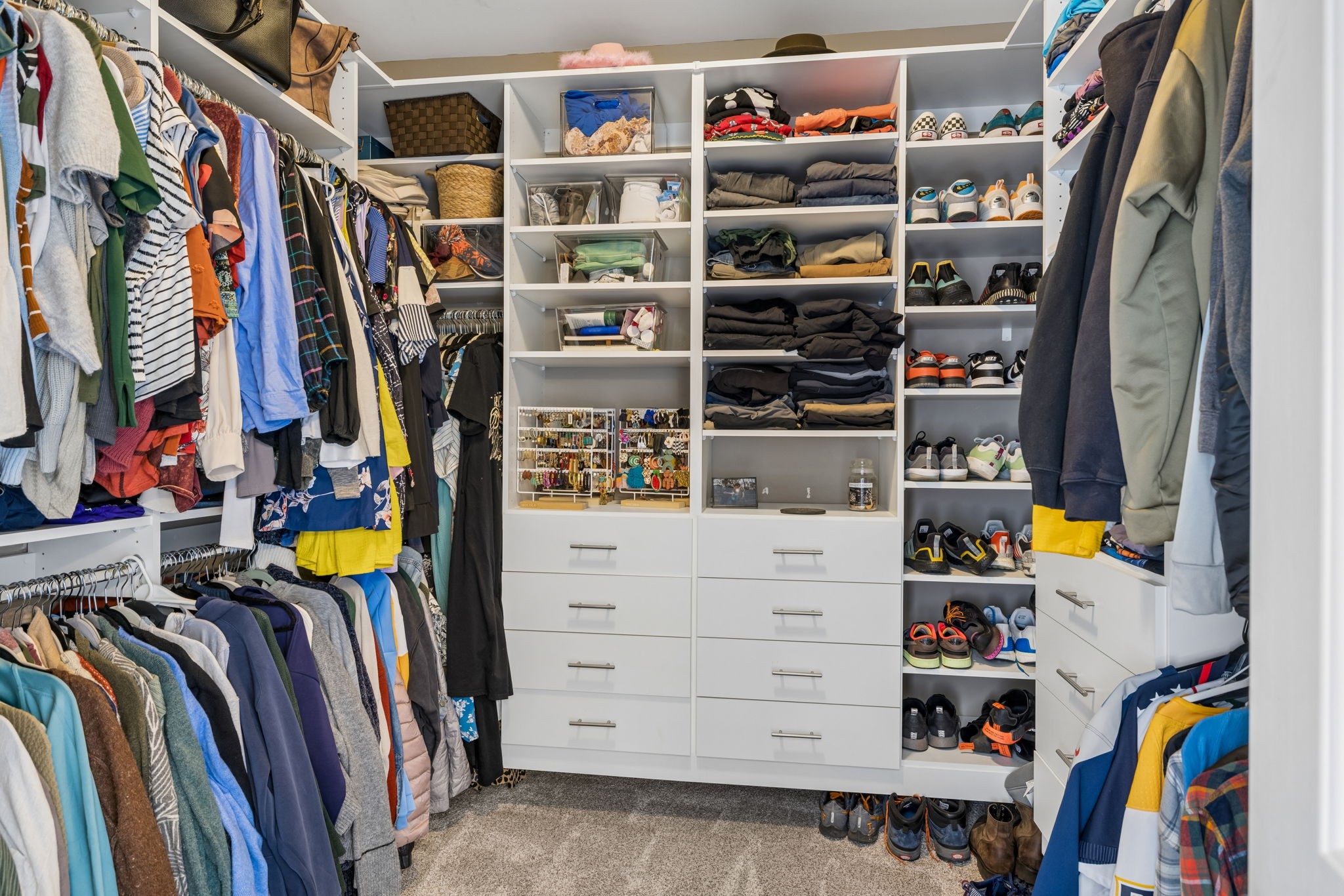 1062 Kacie Drive Pleasant View, TN 37146 - Photo 43 of 67 a view of walk in closet with clothes and shoes