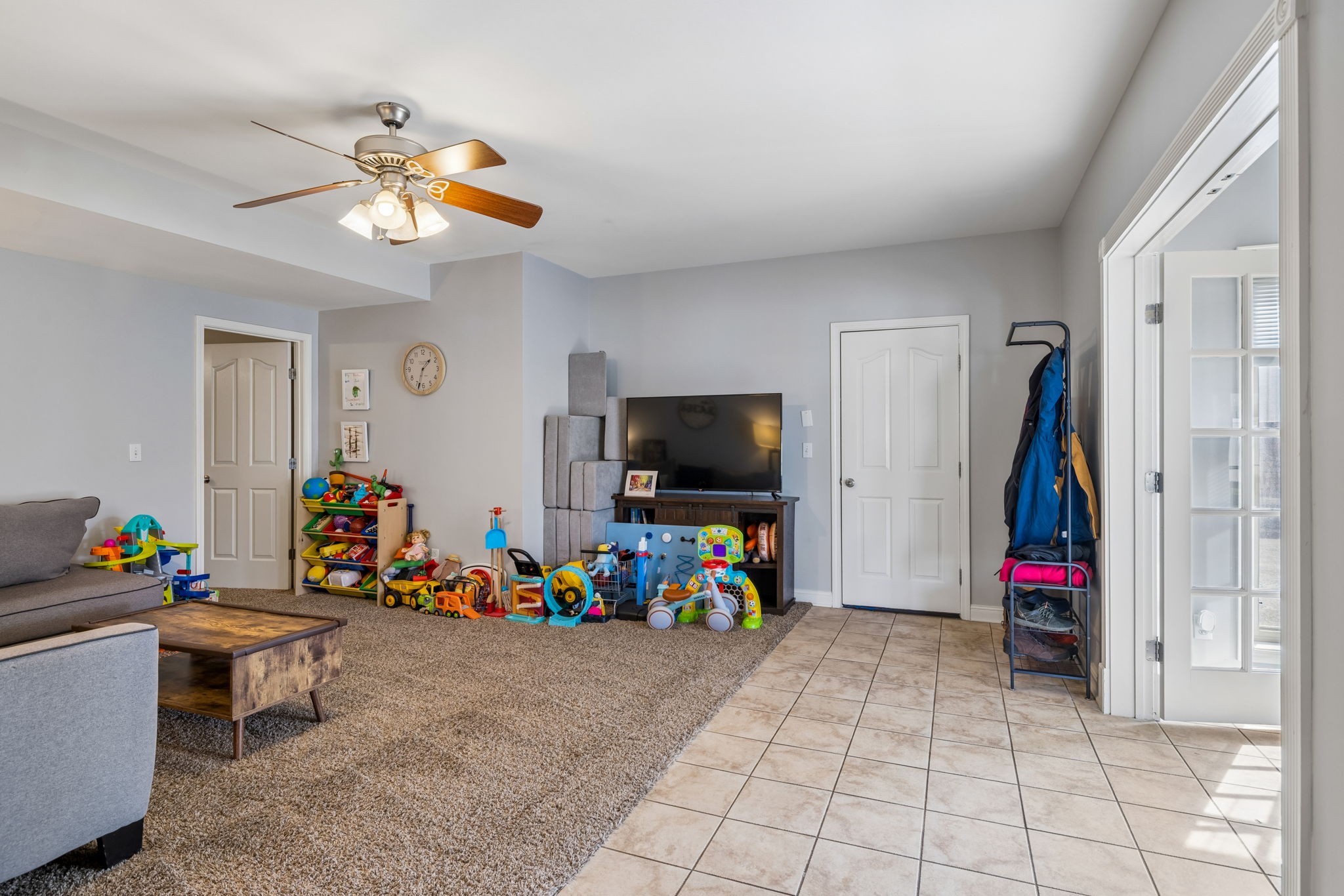 1062 Kacie Drive Pleasant View, TN 37146 - Photo 47 of 67 a living room with furniture and a flat screen tv