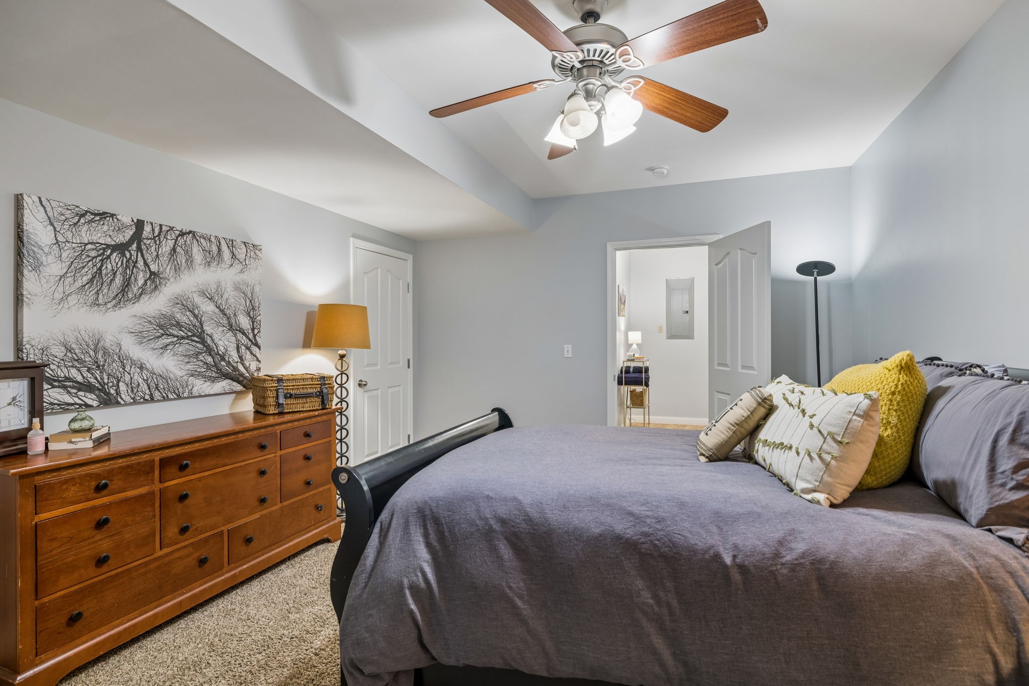 1062 Kacie Drive Pleasant View, TN 37146 - Photo 53 of 67 a bedroom with a bed and a chandelier