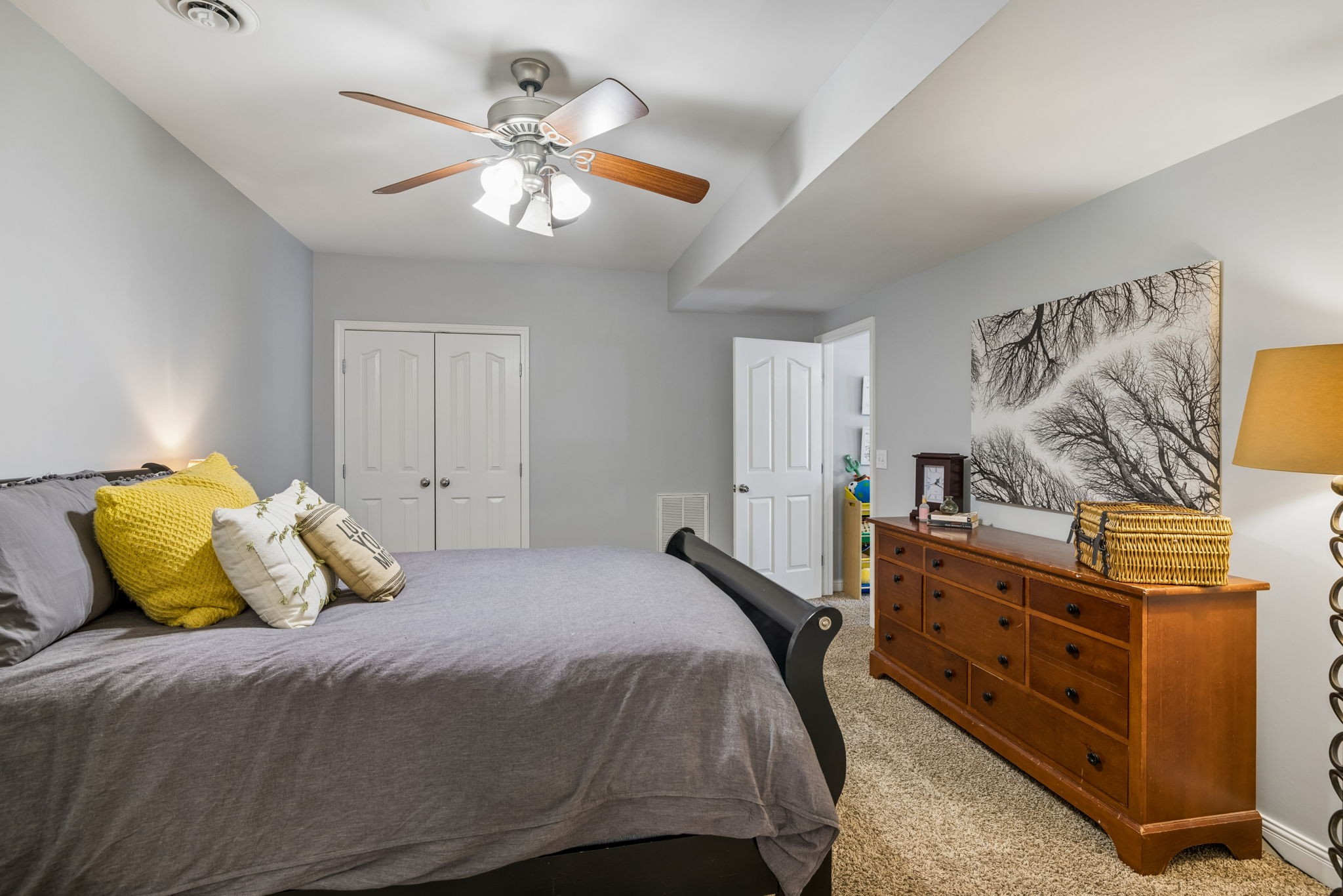 1062 Kacie Drive Pleasant View, TN 37146 - Photo 54 of 67 a bedroom with a bed and a chandelier