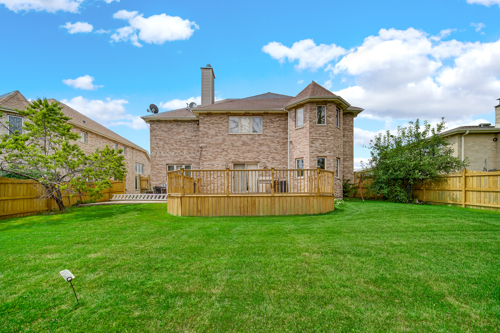 9131 Delphia Street Des Plaines, IL 60016 - Photo 2 of 14 a view of a house with a yard