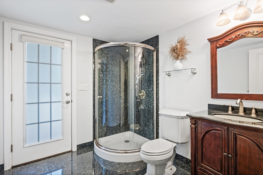 20 Stagecoach Road Topsfield, MA 01983 - Photo 19 of 42 a bathroom with a toilet a sink and a mirror