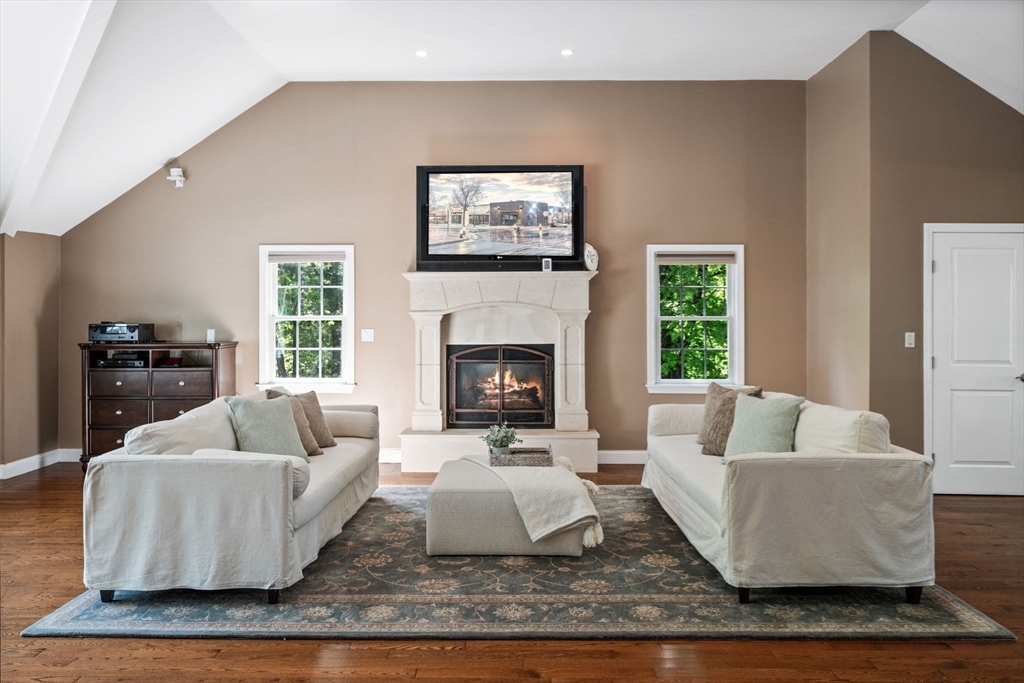 20 Stagecoach Road Topsfield, MA 01983 - Photo 21 of 42 a living room with furniture and a fireplace