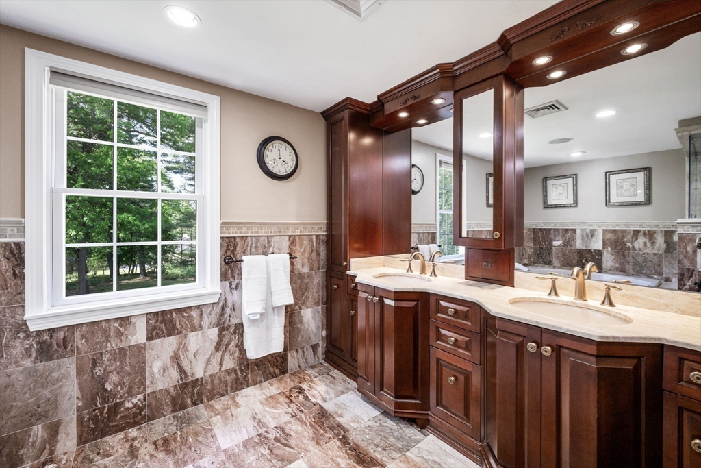 20 Stagecoach Road Topsfield, MA 01983 - Photo 25 of 42 a bathroom with a sink and a mirror