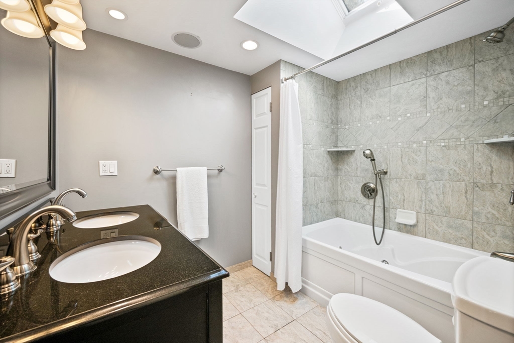 20 Stagecoach Road Topsfield, MA 01983 - Photo 31 of 42 a bathroom with a sink and a mirror