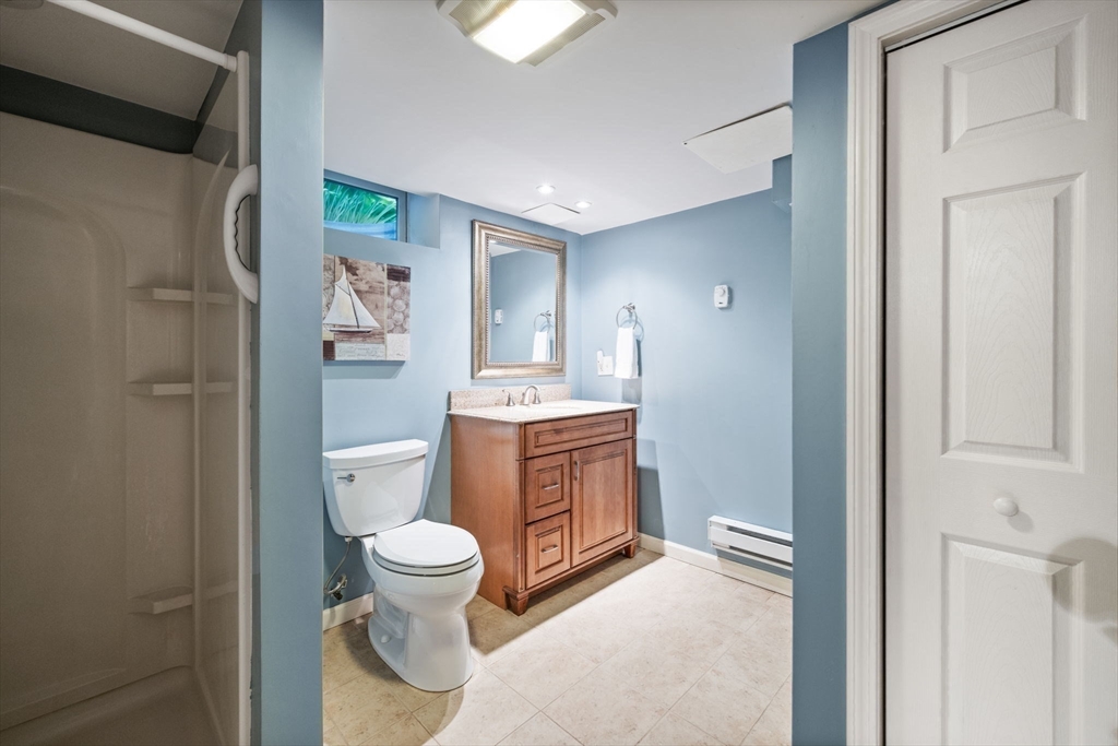 20 Stagecoach Road Topsfield, MA 01983 - Photo 37 of 42 a bathroom with a sink toilet vanity and shower