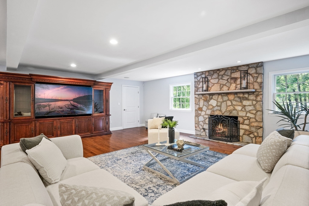 20 Stagecoach Road Topsfield, MA 01983 - Photo 10 of 42 a living room with furniture and a fireplace