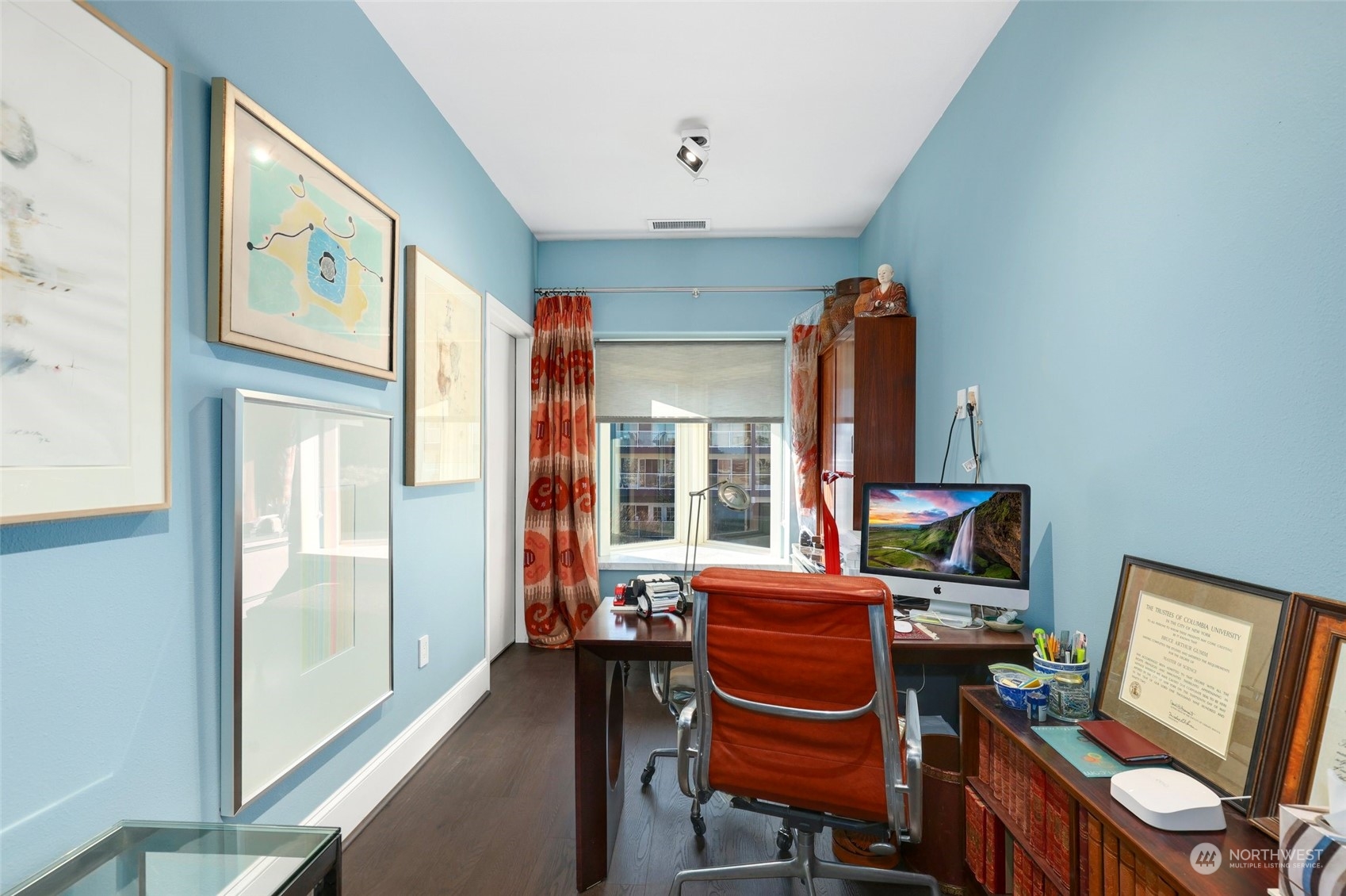 207 Broadway, Unit 500 Tacoma, WA 98402 - Photo 32 of 40 a view of a workspace with furniture and a window
