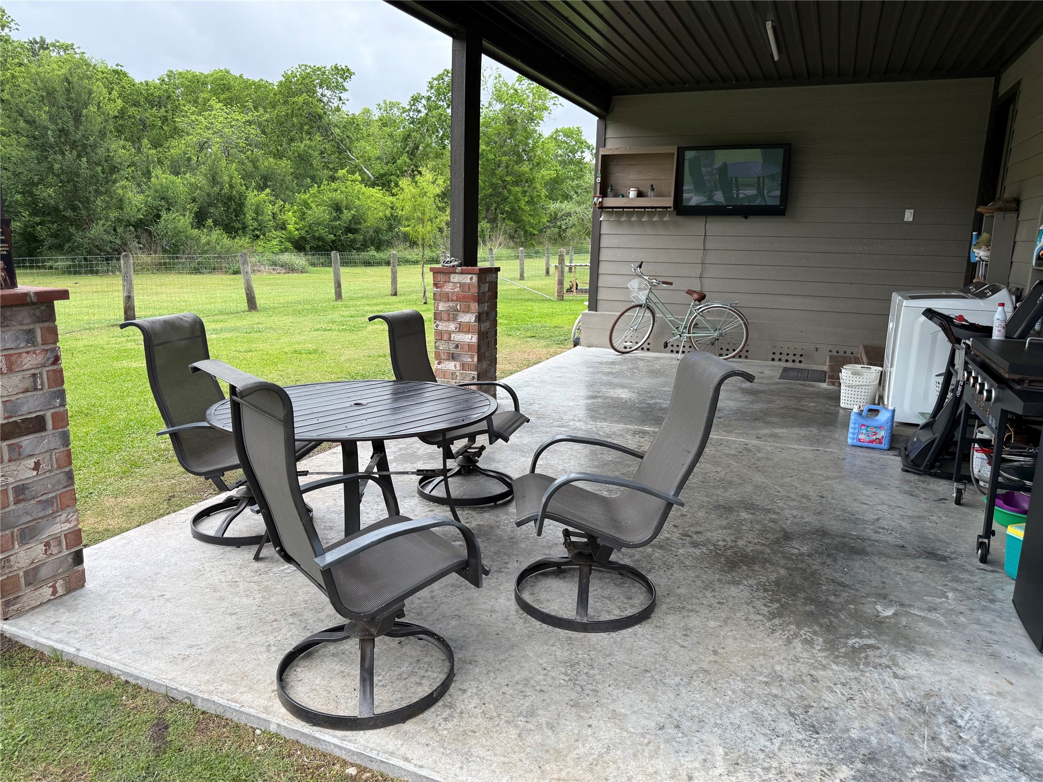 13125 1st Street Kendleton, TX 77417 - Photo 12 of 23 a view of a chairs and table in patio