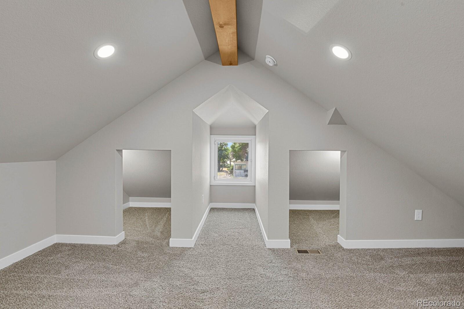 407 Hover Street Longmont, CO 80503 - Photo 22 of 39 an empty room with windows and entrance