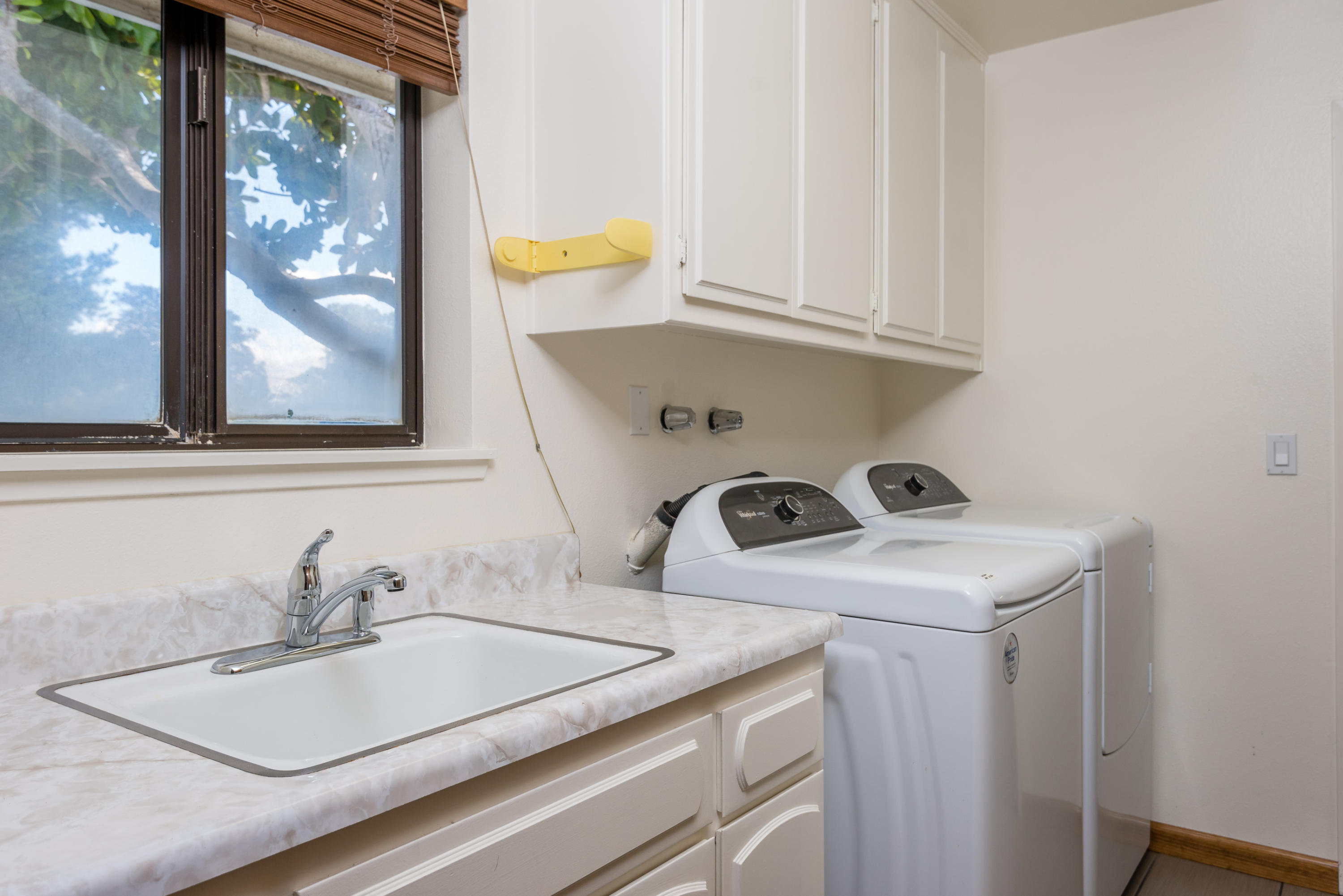 1815 Tularosa Road Lompoc, CA 93436 - Photo 29 of 35 a bathroom with a sink and a window