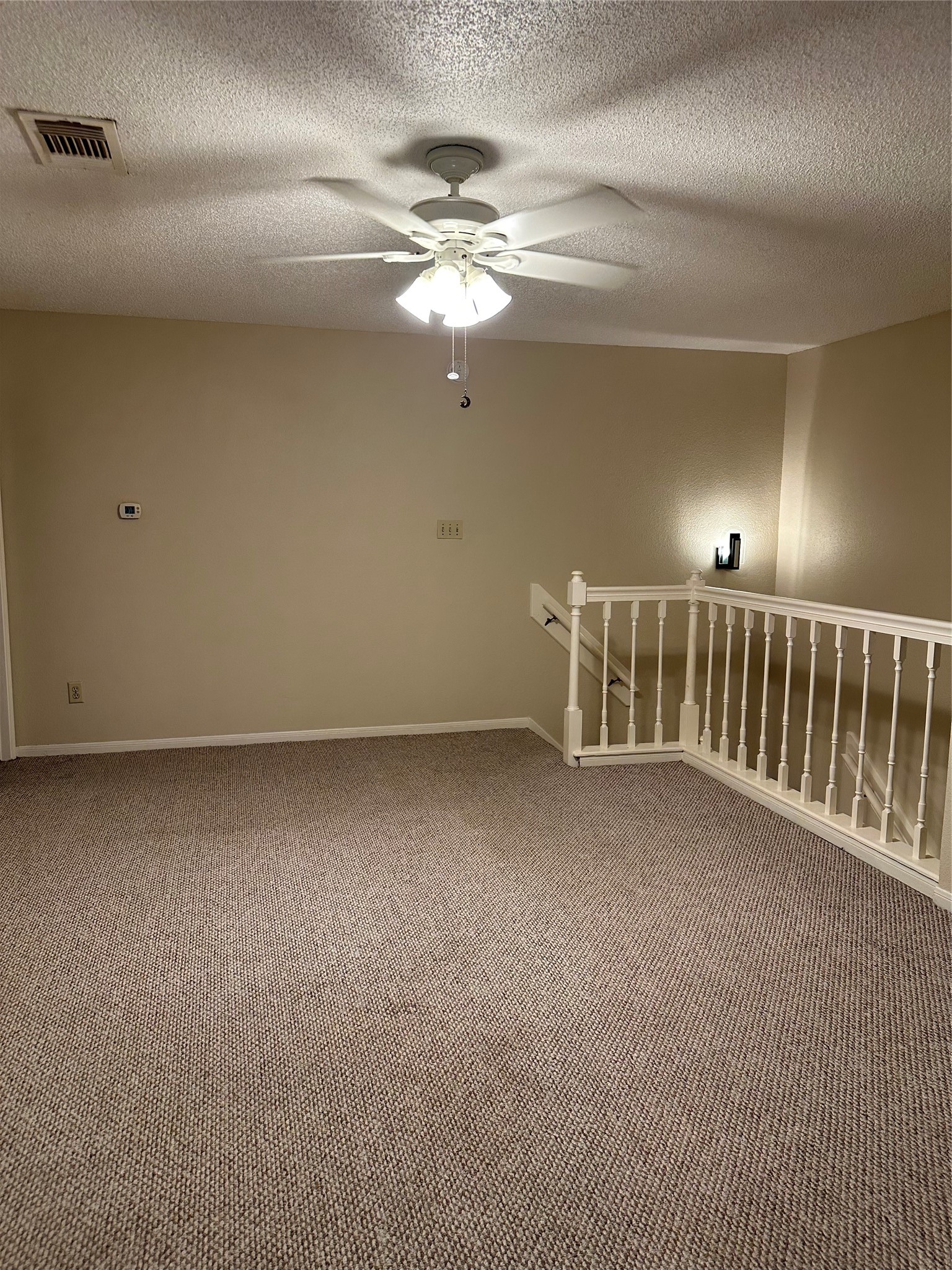 2121 Hepburn Street, Unit 310 Houston, TX 77054 - Photo 8 of 8 a view of a livingroom with a ceiling fan and window