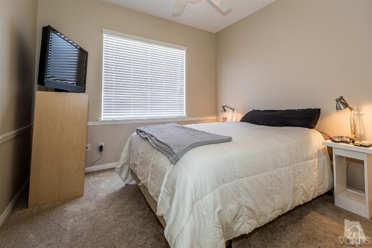 9898 Rhone Street Ventura, CA 93004 - Photo 20 of 44 a bed sitting in a bedroom next to a window