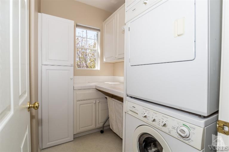 9898 Rhone Street Ventura, CA 93004 - Photo 27 of 44 a utility room with dryer and washer