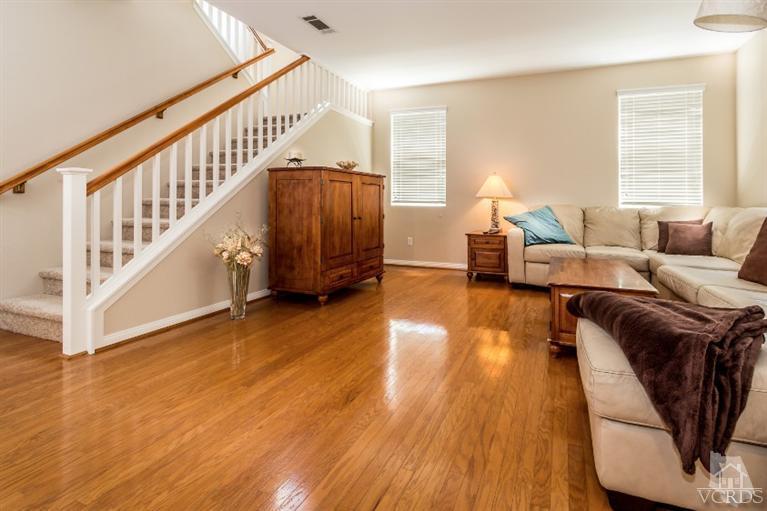 9898 Rhone Street Ventura, CA 93004 - Photo 3 of 44 a living room with furniture and a wooden floor