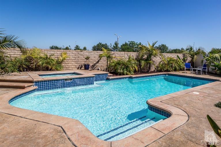 9898 Rhone Street Ventura, CA 93004 - Photo 33 of 44 a view of a backyard with plants and lake view