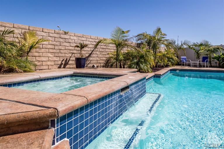 9898 Rhone Street Ventura, CA 93004 - Photo 37 of 44 a view of a swimming pool with a yard