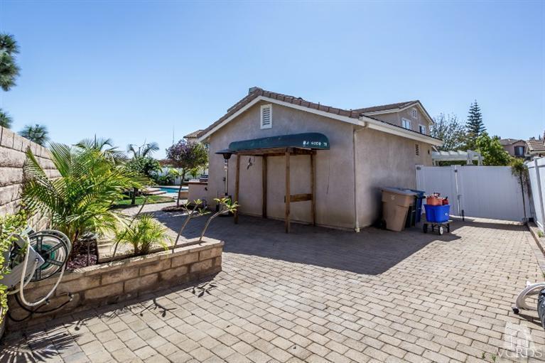 9898 Rhone Street Ventura, CA 93004 - Photo 41 of 44 a backyard of a house with seating space