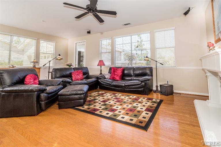 9898 Rhone Street Ventura, CA 93004 - Photo 10 of 44 a living room with furniture rug and wooden floor