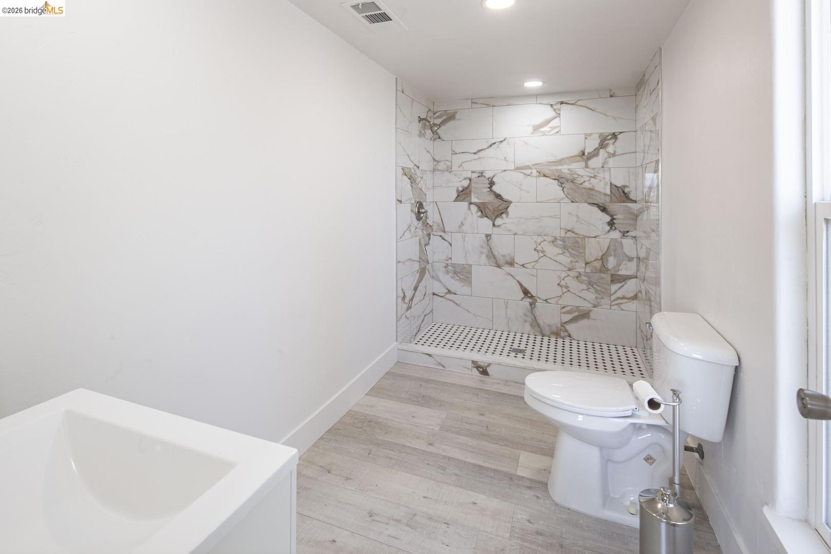 14594 Perricone Road Jamestown, CA 95327 - Photo 22 of 39 a bathroom with a sink a toilet and shower