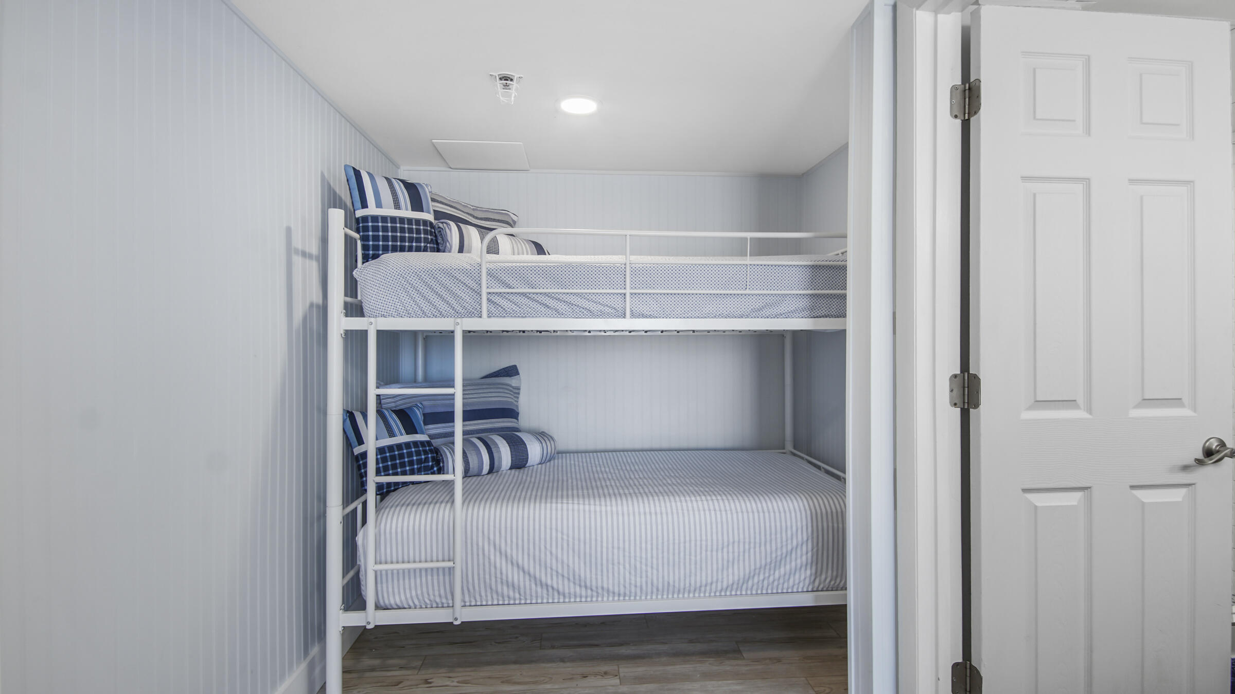 10509 Front Beach Road, Unit 100 Panama City Beach, FL 32408 - Photo 23 of 52 a bedroom with a bed and a table