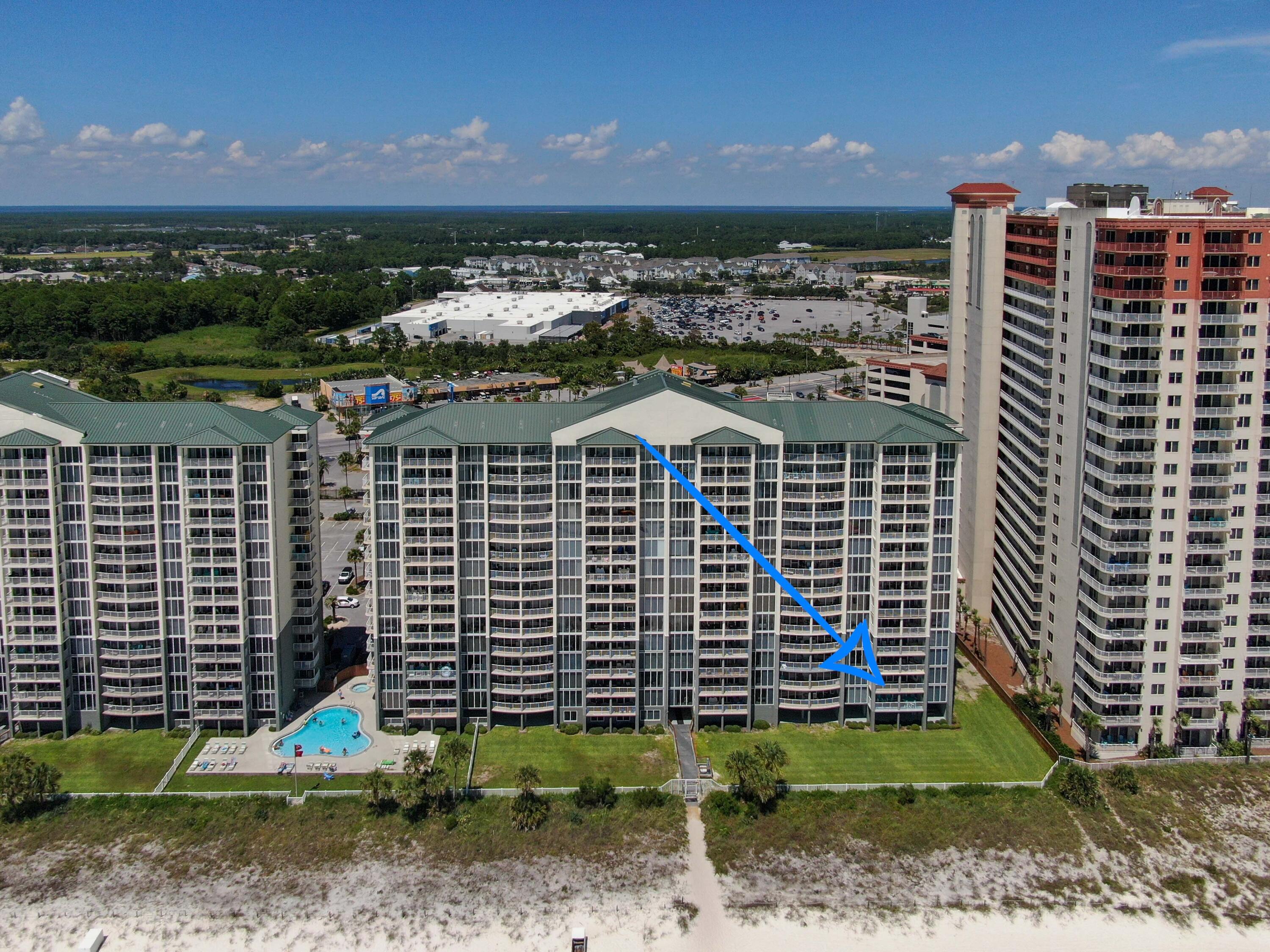 10509 Front Beach Road, Unit 100 Panama City Beach, FL 32408 - Photo 3 of 52 a view of a balcony with a yard