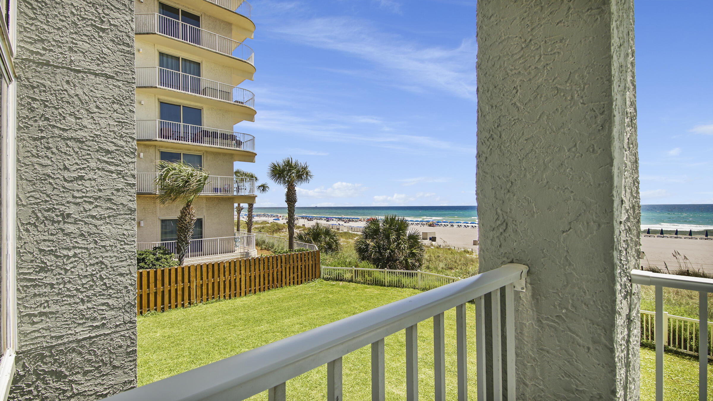 10509 Front Beach Road, Unit 100 Panama City Beach, FL 32408 - Photo 39 of 52 a view of a building from a balcony
