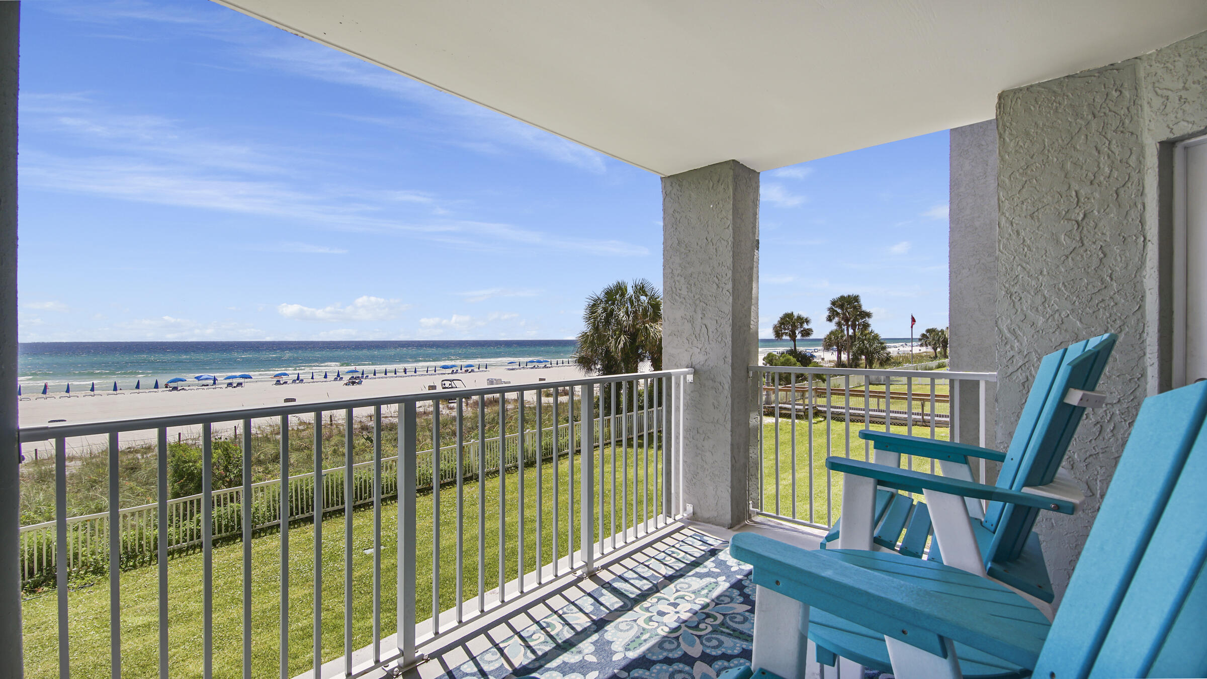 10509 Front Beach Road, Unit 100 Panama City Beach, FL 32408 - Photo 42 of 52 a view of a balcony with furniture