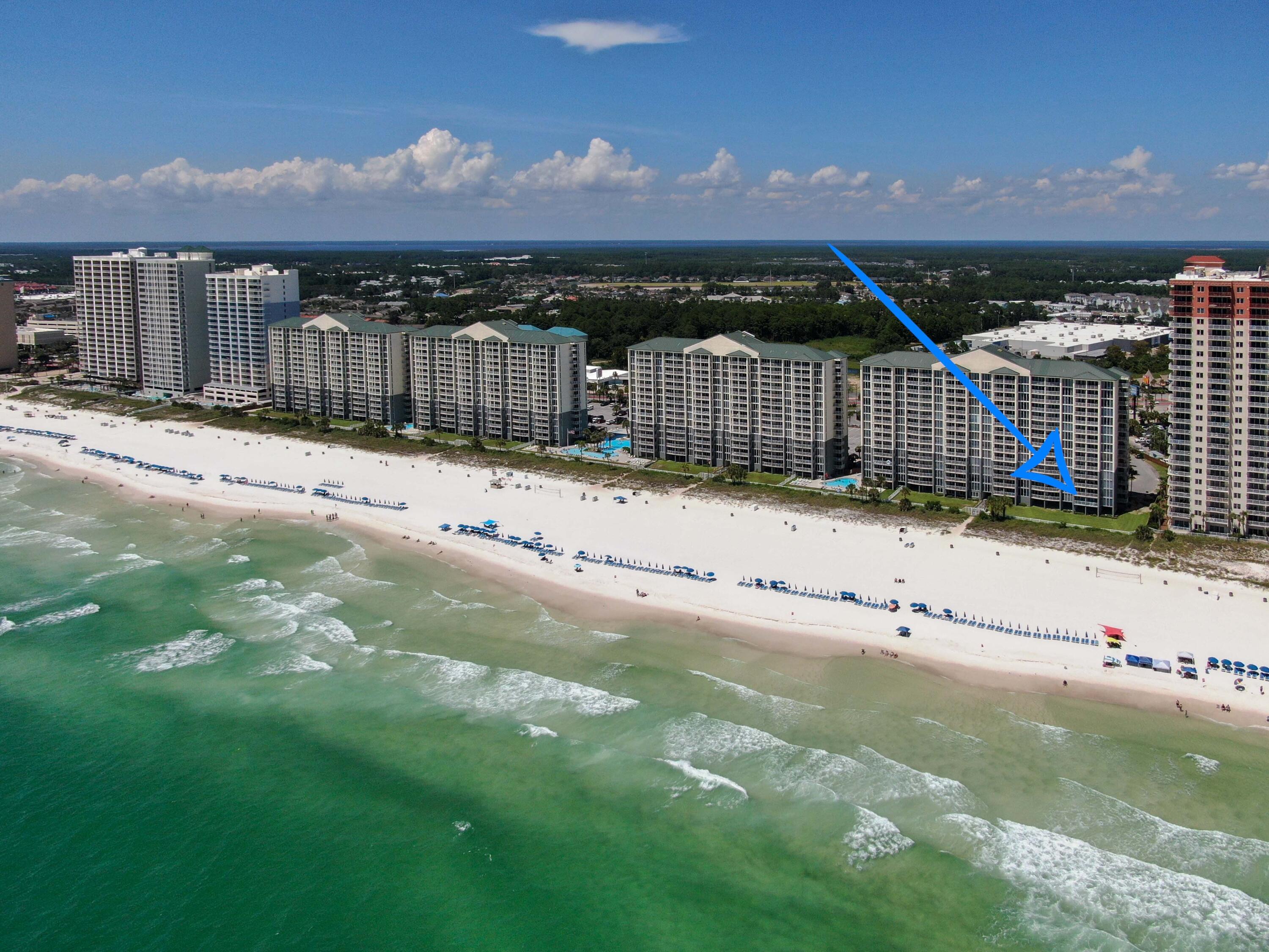 10509 Front Beach Road, Unit 100 Panama City Beach, FL 32408 - Photo 51 of 52 a view of a house with a yard
