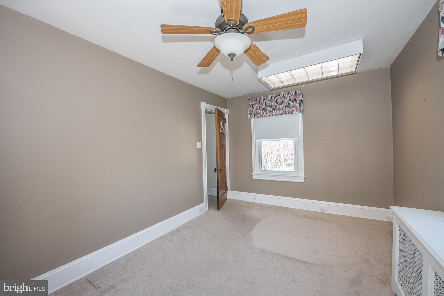420 Darby Road Havertown, PA 19083 - Photo 14 of 21 a view of an empty room with a window