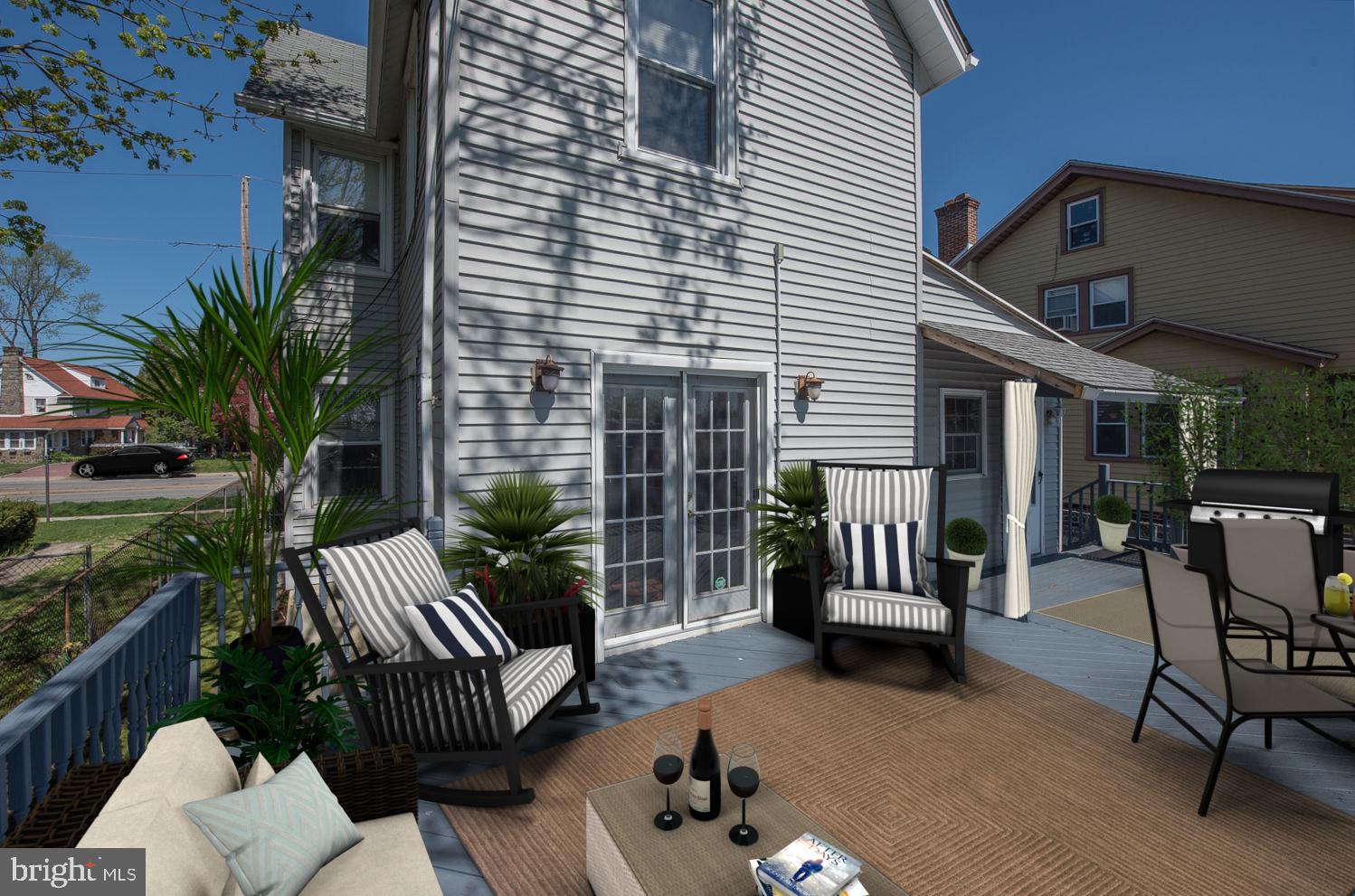 420 Darby Road Havertown, PA 19083 - Photo 17 of 21 a view of a patio with couches table and chairs and potted plants
