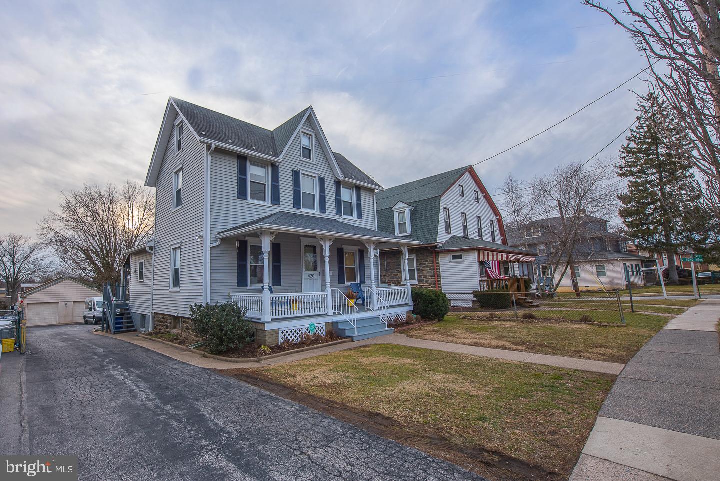 420 Darby Road Havertown, PA 19083 - Photo 20 of 21 a front view of a house with a yard