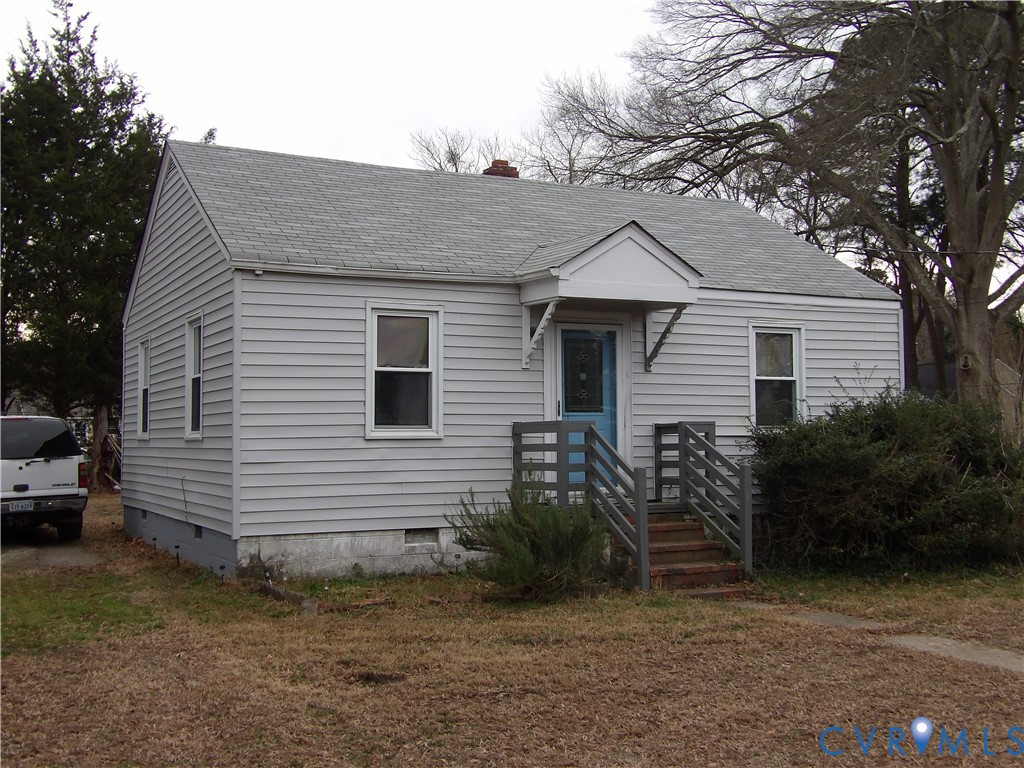 705 Adams Road Williamsburg, VA 23185 - Photo 2 of 4 a view of backyard of house