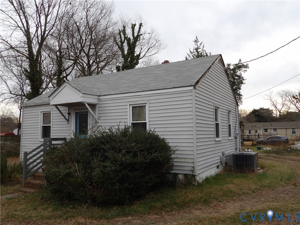 705 Adams Road Williamsburg, VA 23185 - Photo 3 of 4 a view of a house with a yard