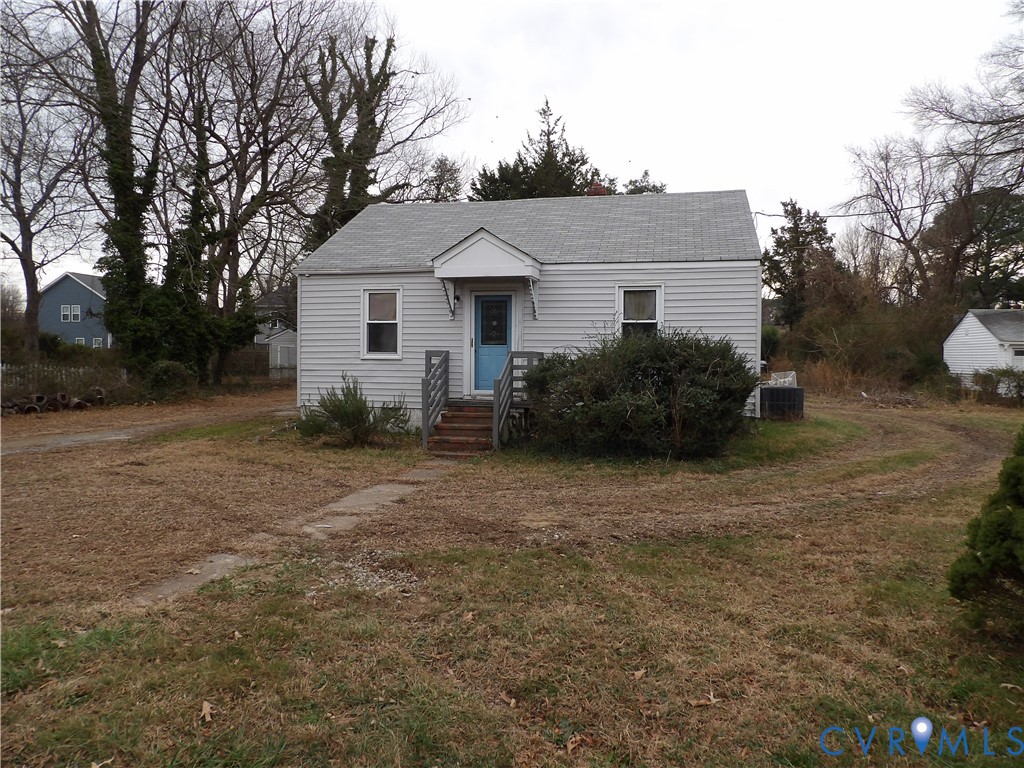 705 Adams Road Williamsburg, VA 23185 - Photo 4 of 4 a view of a house with a yard and plants