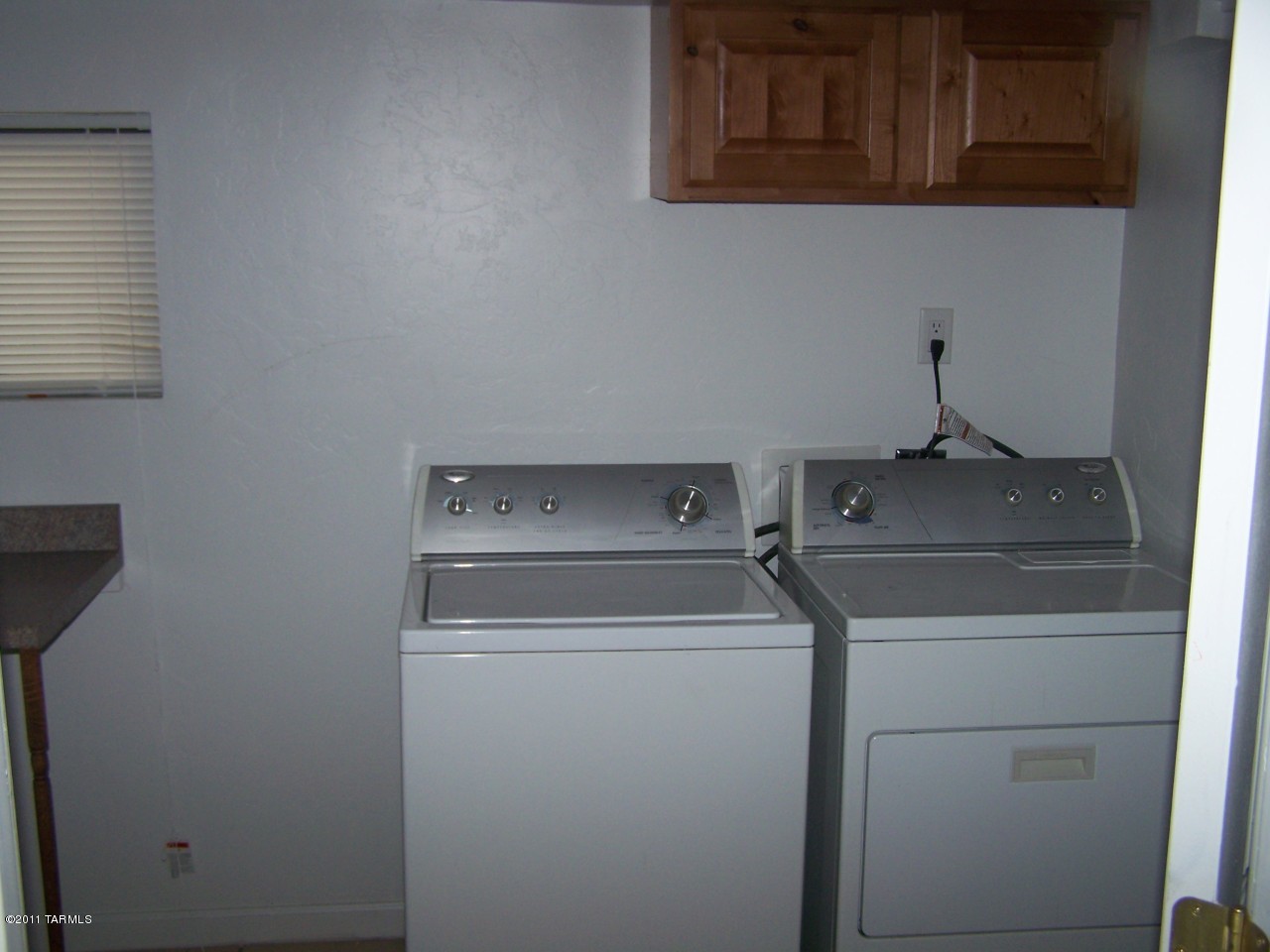 456 West Thurber Road Tucson, AZ 85705 - Photo 11 of 15 a utility room with dryer and washer
