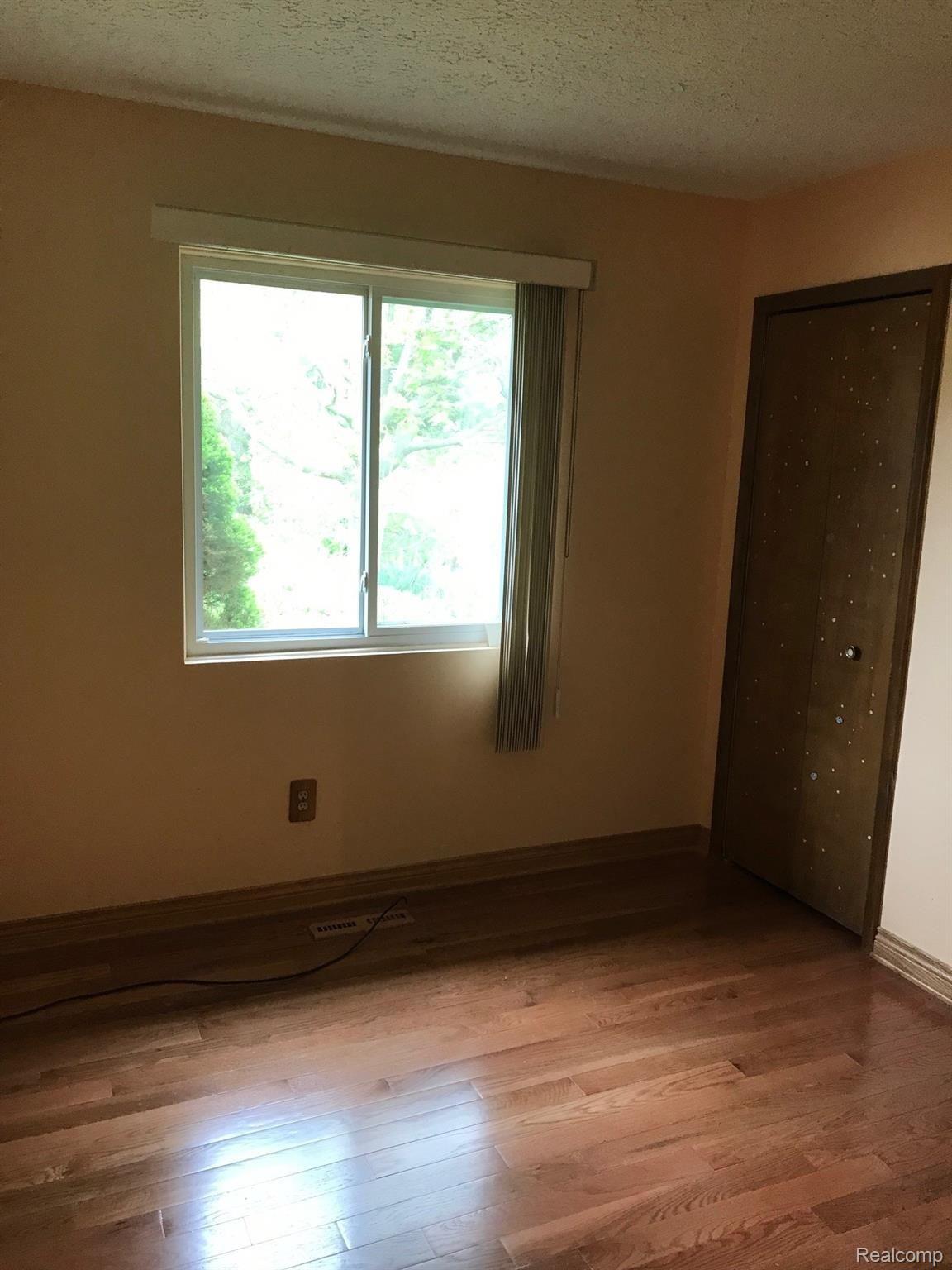 5181 Morrice Road Webberville, MI 48892 - Photo 29 of 58 MAIN FLOOR BEDROOM