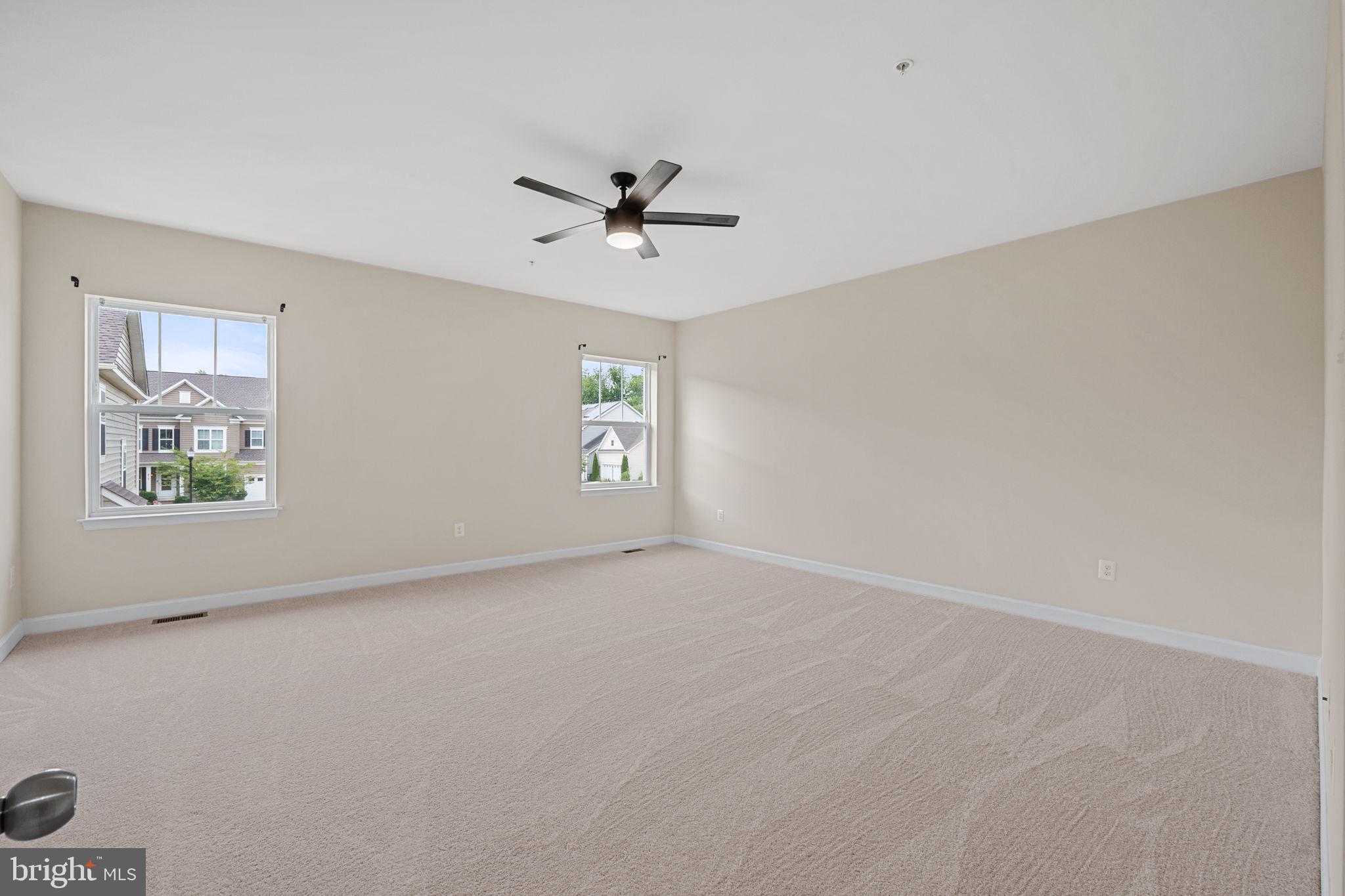 803 Holden Road Frederick, MD 21701 - Photo 26 of 63 a view of an empty room with a window