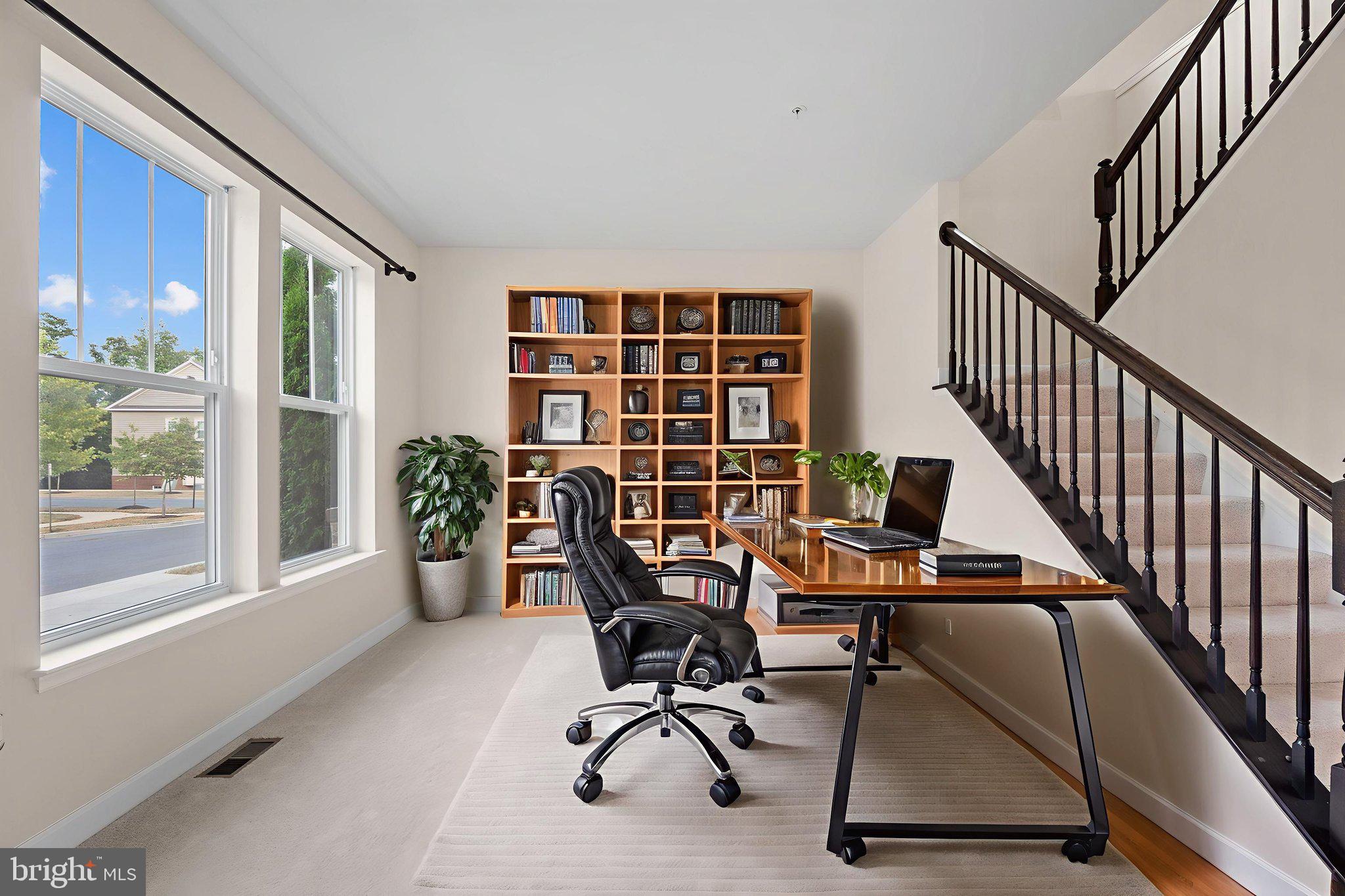 803 Holden Road Frederick, MD 21701 - Photo 5 of 63 a view of a workspace with furniture and a window