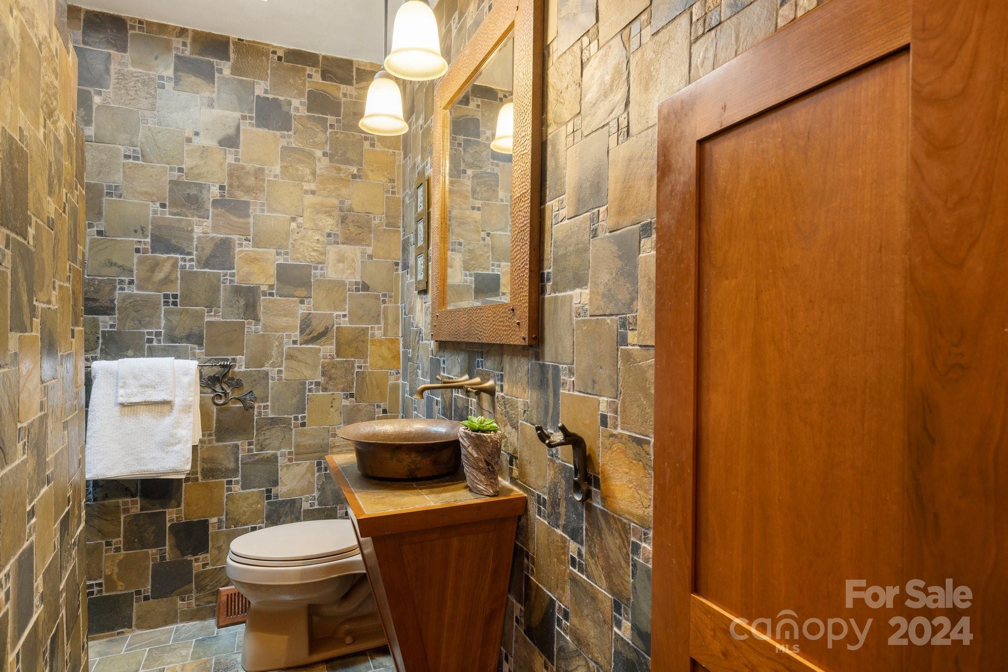 2 Devonshire Place Asheville, NC 28803 - Photo 16 of 47 a bathroom with a sink and toilet